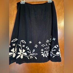 Black Skirt with White Floral Appliqué details